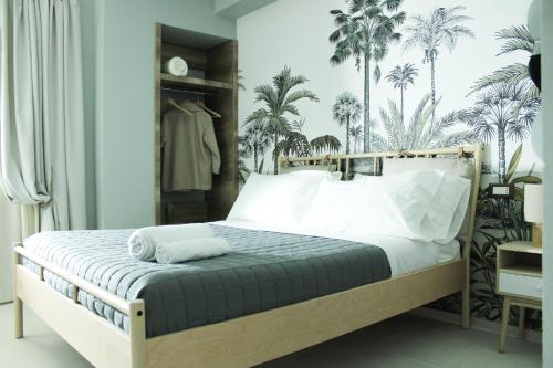 Postel nebo postele na pokoji v ubytování Adhara suite apartaments