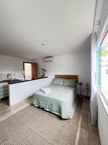 Ένα ή περισσότερα κρεβάτια σε δωμάτιο στο Apartmento Piratininga Niterói