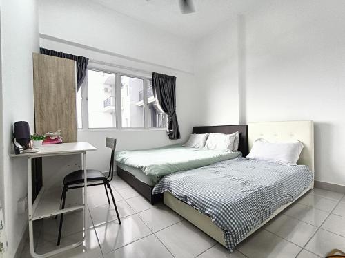 Ένα ή περισσότερα κρεβάτια σε δωμάτιο στο Home Feel - Camellia Suites
