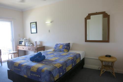 Postel nebo postele na pokoji v ubytování VQ3 Lodge