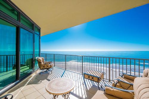 a balcony with a view of the ocean at Phoenix West 1002 in Orange Beach