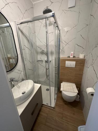 Kúpeľňa v ubytovaní Apartmani Svemir