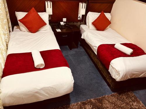 Acorn Lodge Hotel Gatwick & Parkingにあるベッド