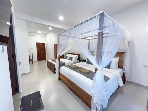 Ένα ή περισσότερα κρεβάτια σε δωμάτιο στο O2 Luxe Living - Private Apartments