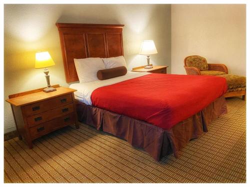 Katil atau katil-katil dalam bilik di Galesburg Extended Stay