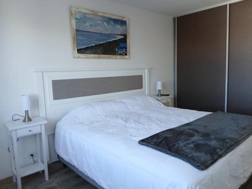 En eller flere senge i et værelse på Punta Ameghino