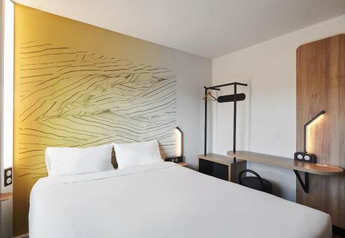 Postel nebo postele na pokoji v ubytování B&B HOTEL Paris Rosny-sous-Bois