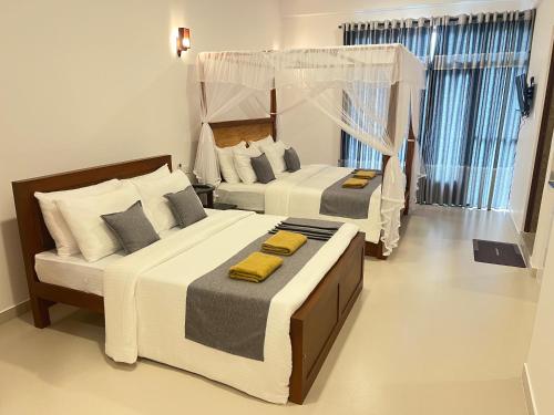 Ένα ή περισσότερα κρεβάτια σε δωμάτιο στο O2 Luxe Living - Private Apartments