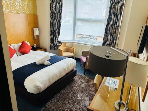 Acorn Lodge Hotel Gatwick & Parkingにあるベッド