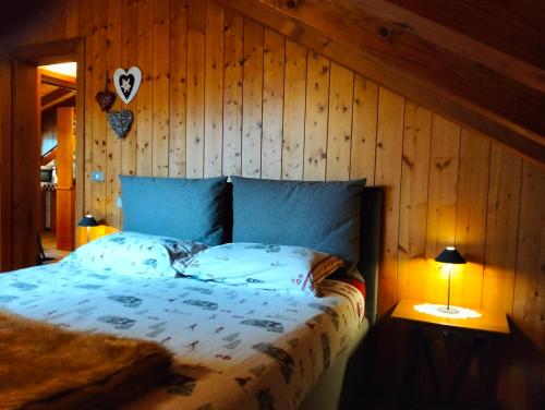 En eller flere senge i et værelse på Deliziosa mansarda con vista Dolomiti