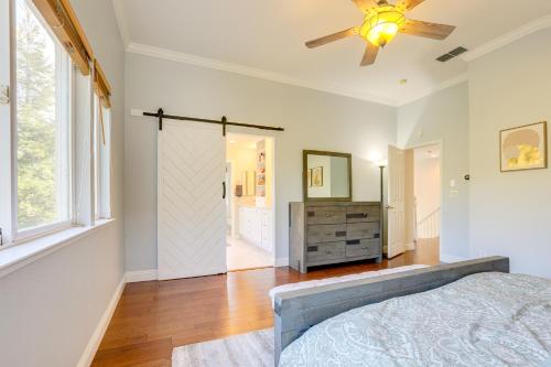 a bedroom with a bed and a ceiling fan at 4 Mi to UC Davis Updated Family Home! in Davis