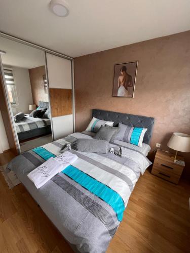 Postel nebo postele na pokoji v ubytování Apartman Enjoy