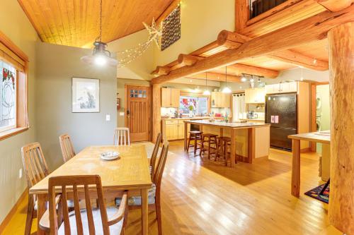 a kitchen and dining room with a table and chairs at 11 Mi to Olympic NP Peaceful Port Angeles Retreat in Port Angeles