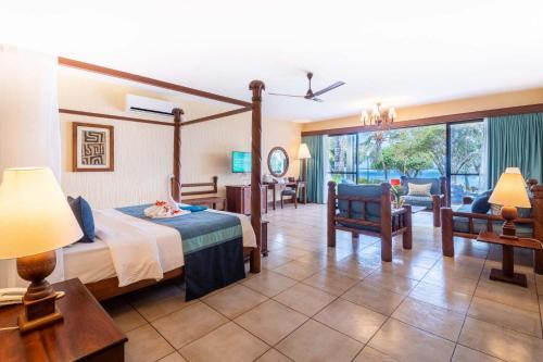 Postel nebo postele na pokoji v ubytování Baobab Beach Resort & Spa