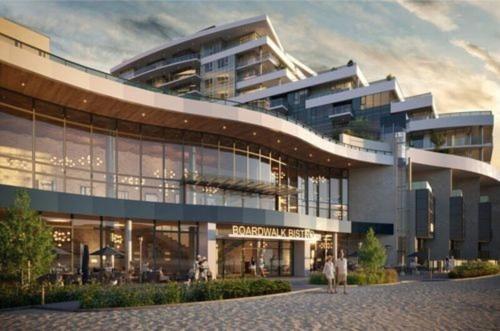 a rendering of a building with people walking in front of it at Beach Lake Resort in Kelowna