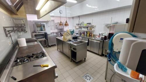 Dapur atau dapur kecil di l'auberge à Audressein