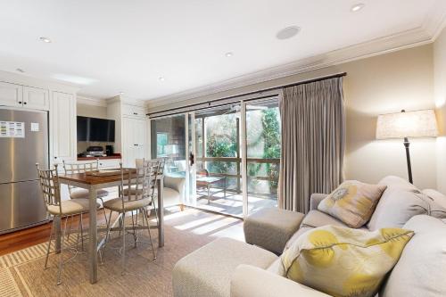 a living room with a couch and a table at Mariner's Watch 4236 in Kiawah Island