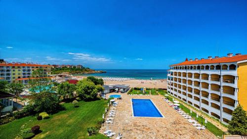 a hotel with a swimming pool and a beach at ApartReginaCarevo in Tsarevo