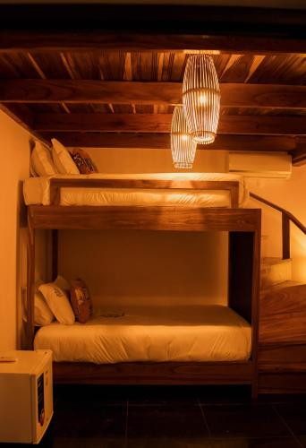 a couple of bunk beds in a room at Kimbo do Soba Resort in Sá da Bandeira