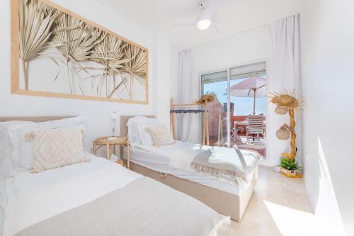 Postel nebo postele na pokoji v ubytování Najlepsze widoki - apartment na plaży 2 sypialnie
