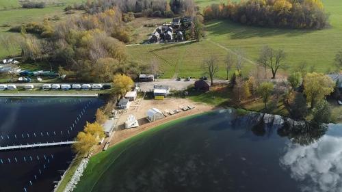 an aerial view of a campgrounds next to a lake at Relax Vila Lipno- Studio u pláže Windy Point in Černá v Pošumaví