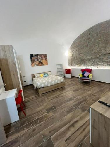 Ένα ή περισσότερα κρεβάτια σε δωμάτιο στο Appia Apartment - Camera Fiorellino
