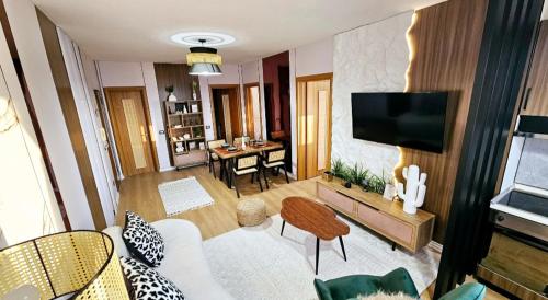 TV a/nebo společenská místnost v ubytování Premium Azure Suites Center
