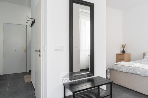 En eller flere senge i et værelse på Roomies Luxembourg Centre Gare