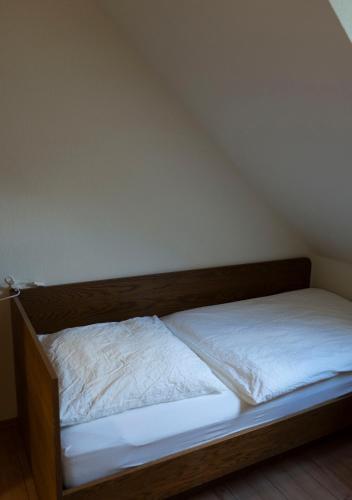 Postel nebo postele na pokoji v ubytování Gaststätte Zur Eiche
