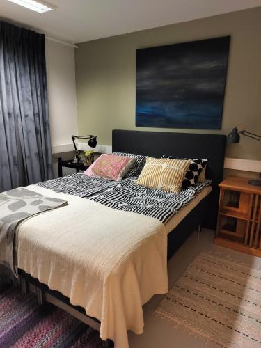 Postel nebo postele na pokoji v ubytování City Apartment Rovaniemi