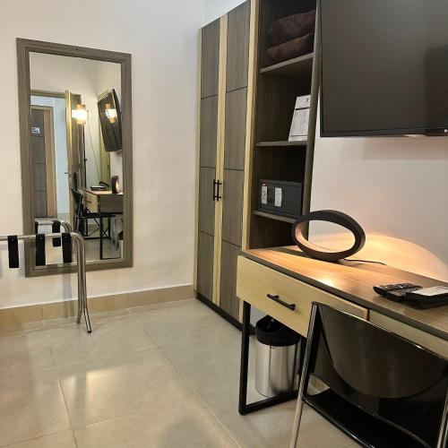 Kuchyň nebo kuchyňský kout v ubytování Hotel Merlott Lleras