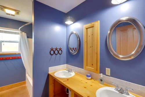 a bathroom with a sink and a mirror at Private Hot Tub and Pickleball Court Baird Home! in Baird