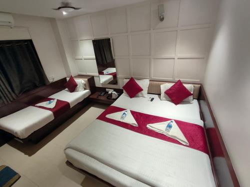 Katil atau katil-katil dalam bilik di Hotel Anand Palace