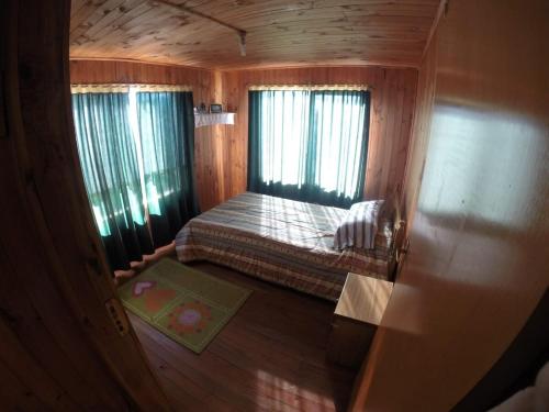 Ένα ή περισσότερα κρεβάτια σε δωμάτιο στο House located in Lifen just meters from the beach