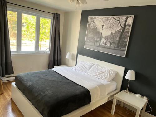 Ένα ή περισσότερα κρεβάτια σε δωμάτιο στο Cute & Spacious 2 BDR condo