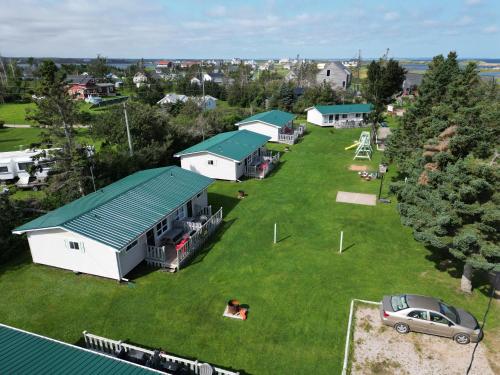 an aerial view of a house with a yard at Stanhope Cottages in Stanhope