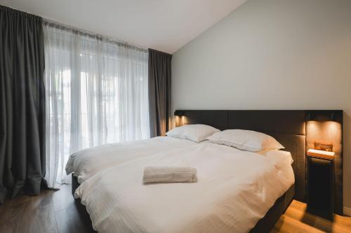 Postel nebo postele na pokoji v ubytování Moon apartment 2
