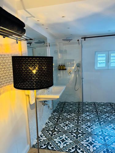 a bathroom with a shower and a sink at Villa Edelweiss Stuhleck in Spital am Semmering