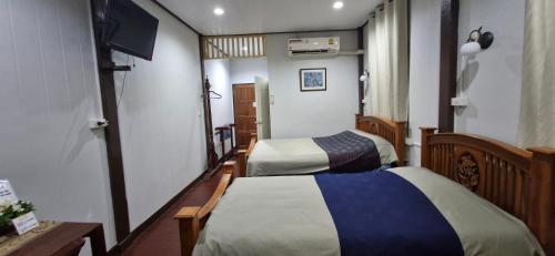Ένα ή περισσότερα κρεβάτια σε δωμάτιο στο OB ARUN House