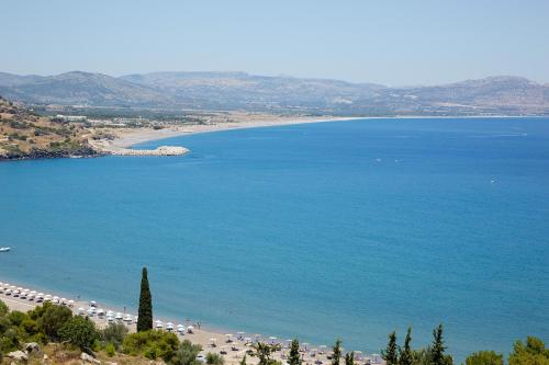 a view of a beach and the ocean at Lindos Mare, Seaside Hotel in Líndos