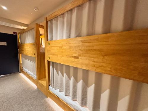a couple of bunk beds in a room at Bluedot Poshtel in Seoul