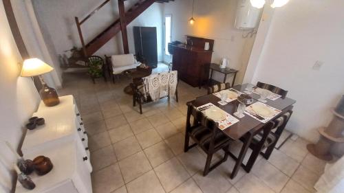 an overhead view of a living room with a table and chairs at Paseo del Escritor in Esquina