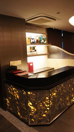 Lounge nebo bar v ubytování Happiness Inn Hotel