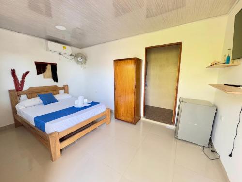 Un ou plusieurs lits dans un hébergement de l'établissement Tintipan Hotel
