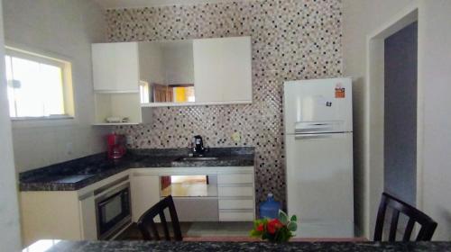 Η κουζίνα ή μικρή κουζίνα στο Casa em iguaba grande