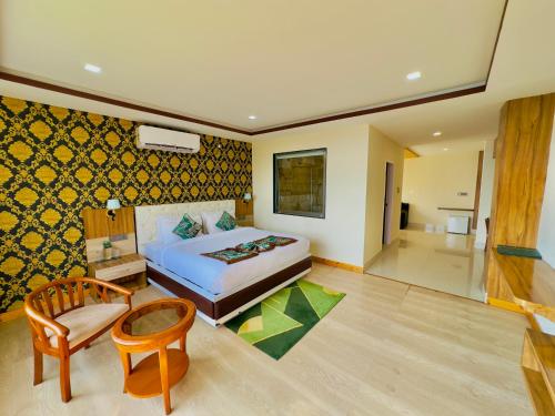 Ένα ή περισσότερα κρεβάτια σε δωμάτιο στο The Z Retreat & Spa Gangtok