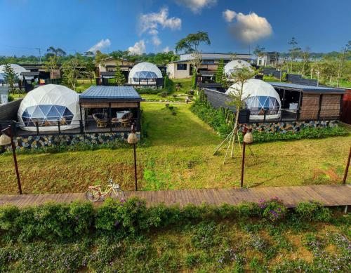 an aerial view of a farm with domes at Olala Glamping Bảo Lộc in Bao Loc