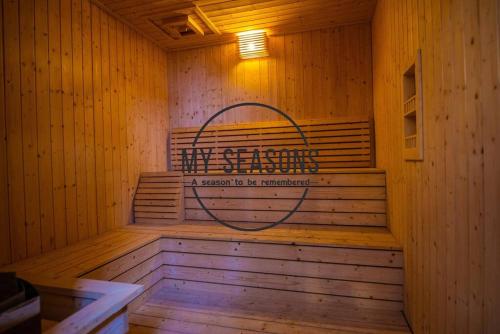 a sauna with a sign on the inside of it at Timurbay by My Seasons in Kuantan