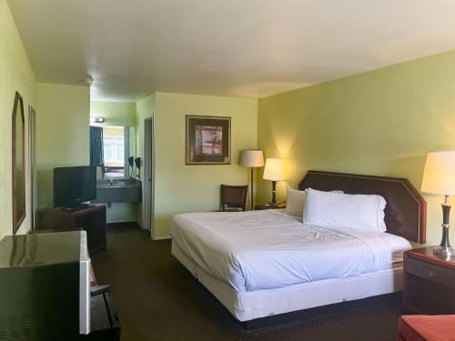 Postel nebo postele na pokoji v ubytování Motel 6 Tulia, TX