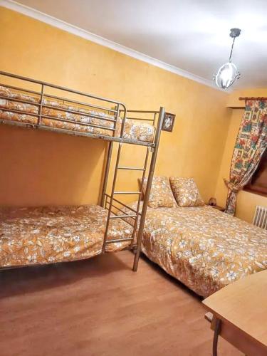 Postel nebo postele na pokoji v ubytování Appartement moderne avec terrasse à Cornimont - 65 m² - BBQ.